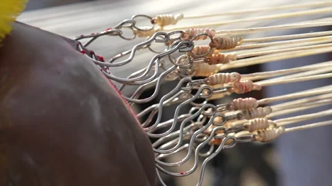 Metal spears and hooks pierce the skin in a spiritual act of devotion. Video stock 318094679