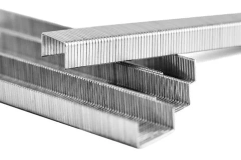Metal staples for stapler , closeup isolated on white background Stock Photos