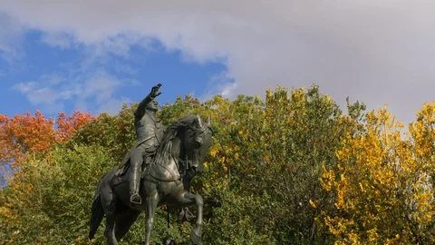 Metal Statue In NYC Union Square Park With Impressive Autumn Trees  Stock Footage 113889935