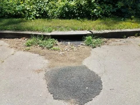 Metal storm drain Stock Photos