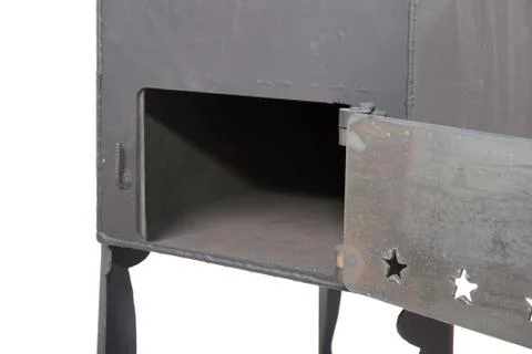 Metal stove on white background Stock Photos