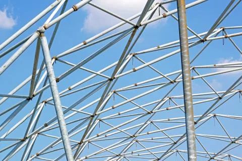 Metal structure with blue sky background Stock Photos