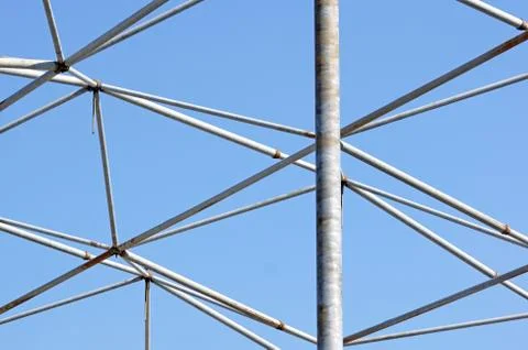 Metal structure with blue sky background Stock Photos