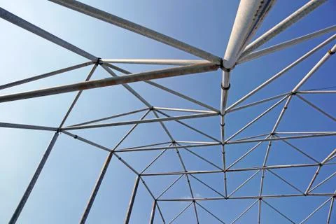 Metal structure with blue sky background Stock Photos