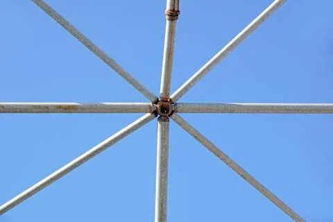 Metal structure with blue sky background Stock Photos