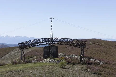 Metal structure tower with concrete base from coal mine cable cart industri.. Stock Photos