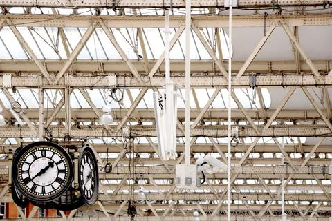 Metal structure of a white ceiling seen from below in the interior Stock Photos