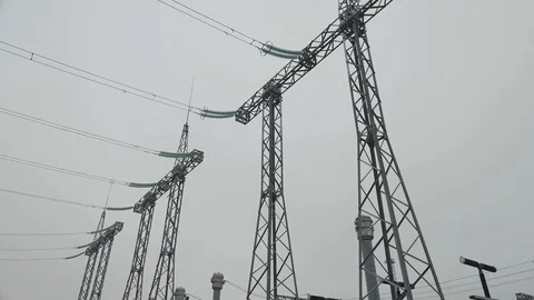 Metal structures and electrical insulators at a high voltage substation against Video stock 128413806