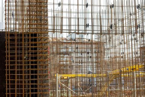 Metal structures, construction of a multi-storey house or a shopping center Stock Photos