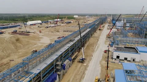 Metal structures during the construction of a huge factory. Stock Footage 138255613