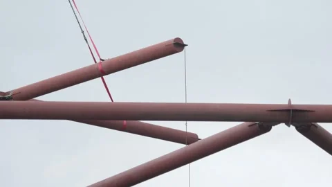 Metal structures lifted by crane Stock Footage 270539173