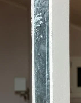 Metal stud framing supporting plasterboard wall during home renovation Stock Photos