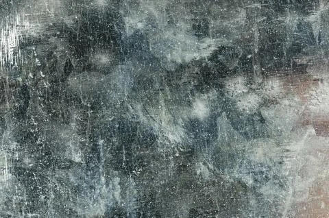 Metal surface showing texture and scratches in grey and black tones Stock Photos