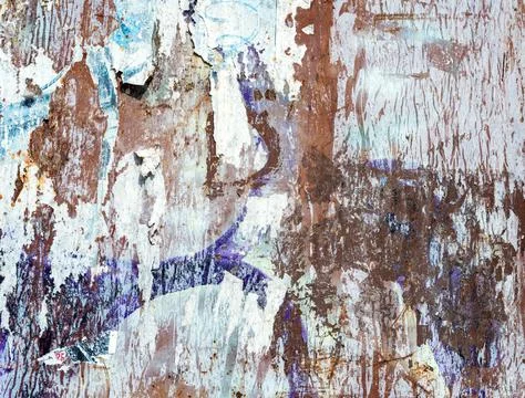 Metal surface with traces of torn posters and peeling paint Stock Photos