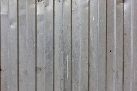 Metal surface vertical stripes pattern texture background Stock Photos