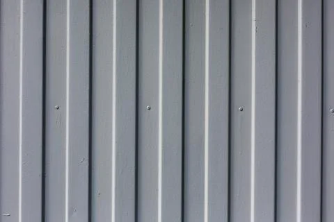 Metal surface vertical stripes pattern texture background Foto stock