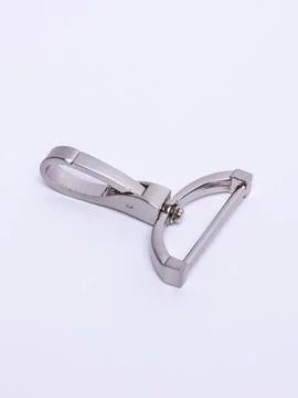 Metal swivel hook hardware single Stock Photos