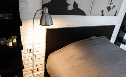 Metal Task Lamp with an adjustable reading light. Steel downbridge floor lamp Stock Photos