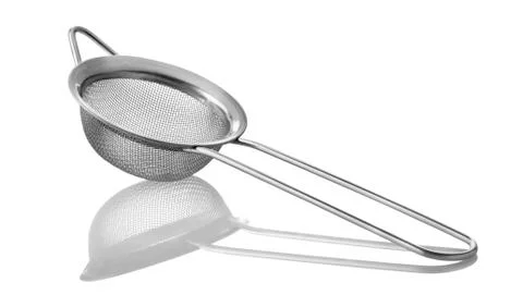 Metal tea strainer Stock Photos
