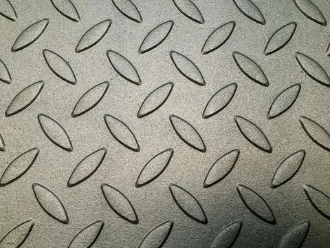 Metal texture for background. Embossed sheet metal. Stock Photos