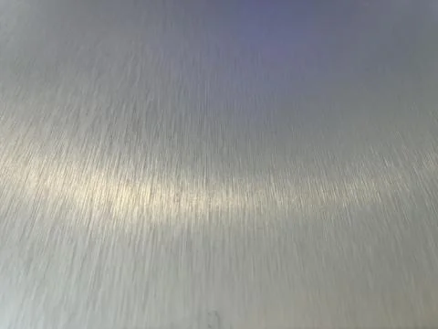 Metal texture background with linear surface patterns Stock Photos