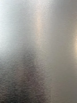Metal texture background with linear surface patterns Stock Photos