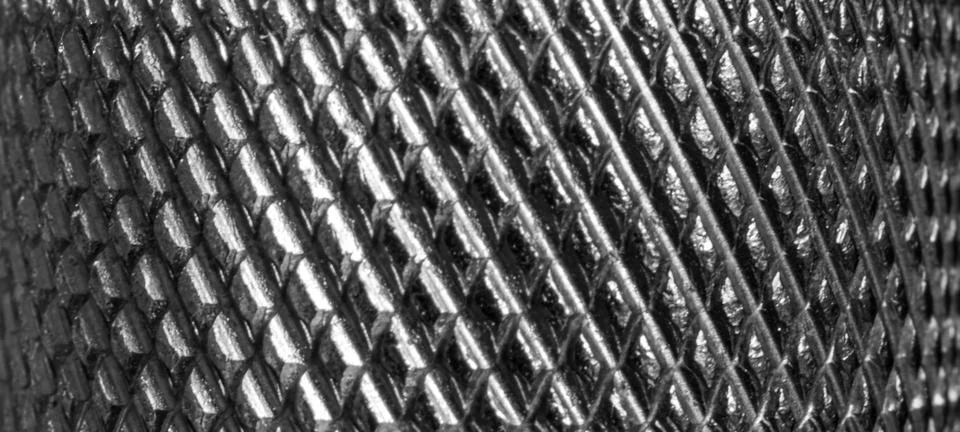 Metal texture with diamond pattern. Abstract background of steel. Banner. Stock Photos