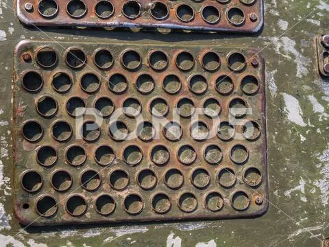 Metal texture of military equipment of protective color Stock Photos