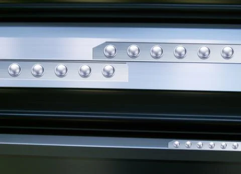 Metal texture with silver rivets Stock Photos