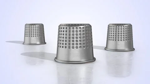 Metal Thimbles on a Light Reflective Floor. Vintage Thimbles 3D Animation. 4K Stock Footage 301865170