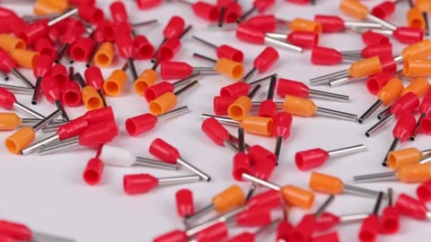 Metal tips with a plastic base for mounting on stranded copper wires. Stock Footage 340427586