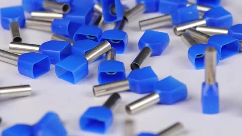 Metal tips with a plastic base for mounting on stranded copper wires. Stock Footage 340427626