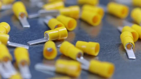 Metal tips with a plastic base for mounting on stranded copper wires. Stock Footage 340428180