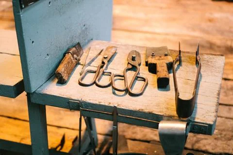 Metal Tools Laid Out to Process Molten Glass Stock Photos