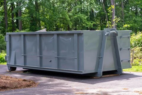 Metal trash construction garbage dumpsters Stock Photos