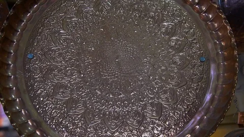 A metal tray with crafted patterns Stock Footage 100848053