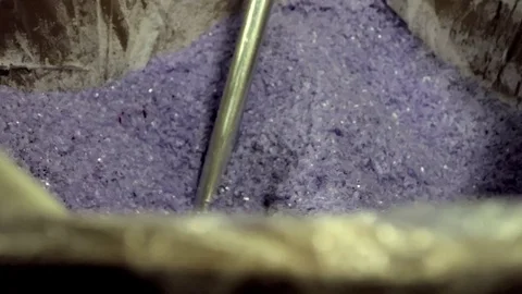 Metal Vacuum Sucks Tiny Plastic Pieces Into A Molding Machine Stock-Footage 78654996