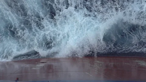 Metal vessel side cuts boundless navy ocean water surface Stock Footage 117674254