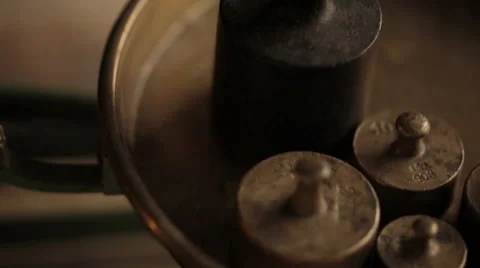 Metal weights added onto mechanical scale - on site sound Stock Footage 45985509