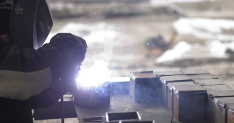 Metal Welder Working With Welding Machine With Bright Sparks And Flashes Weld Stock Footage 145356965
