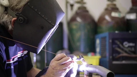 Metal welding a pipe Stock Footage 82441946