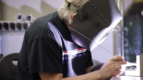 Metal welding a pipe Stock Footage 82442010