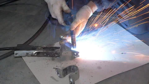 Metal welding process using semi-automatic welding Stock Footage 264072944