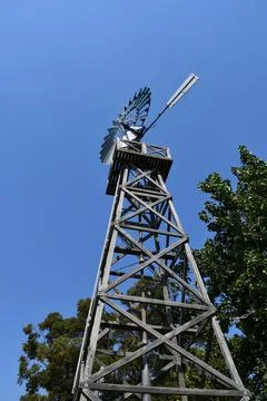 A metal windmill seen from below Stock Photos
