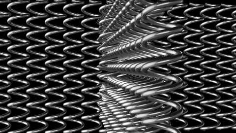 Metal wire pattern creates interesting visual effect with twists and turns .. Stock-Footage 332846672