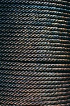 Metal wire roll close-up. Pattern of cables. Stock Photos