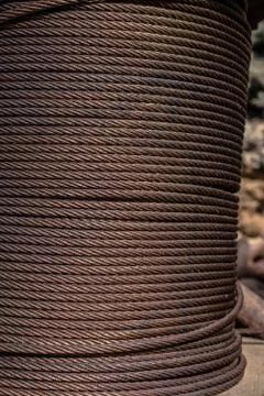 Metal wire roll close-up. Pattern of cables. Stock Photos