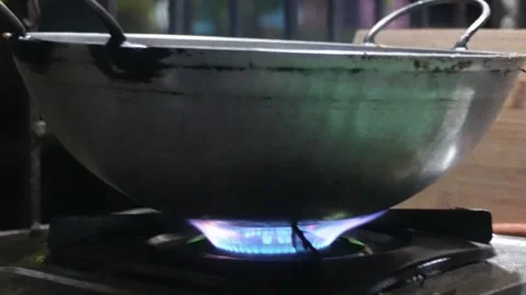 Metal Wok Heating Stock Footage 332602432
