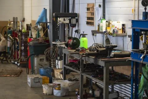 Metal workbench with tools in the workshop. Stock Photos