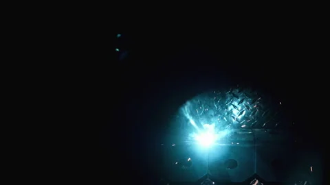 Metal worker welding in dark work shop - high contrast slow motion Stock Footage 168464652